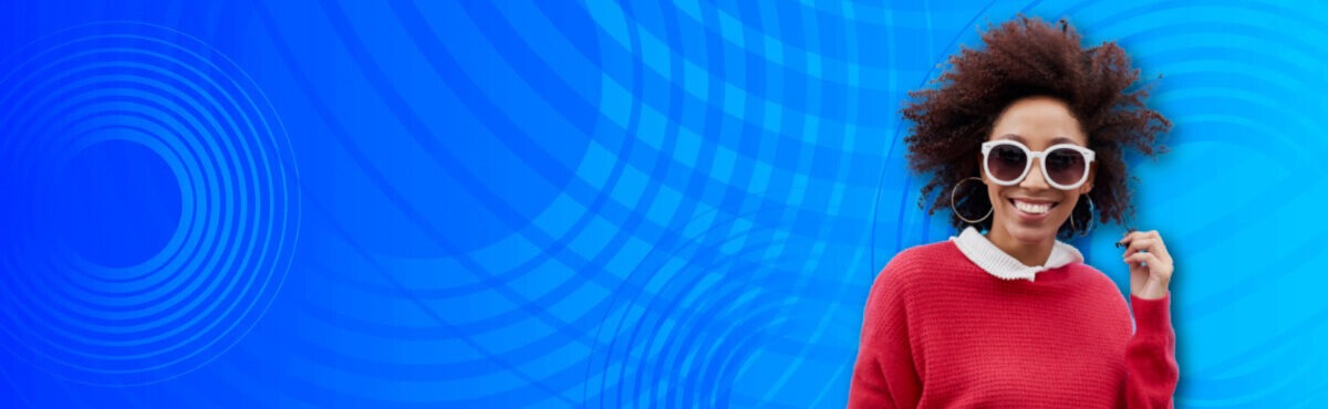 A businesswoman smiles confidently, conveying sales content that helps guide sellers in the B2B buying process.